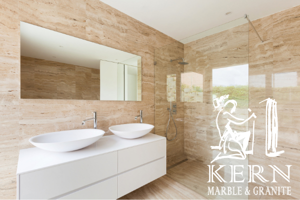 tan and white marble bathroom walls and floor